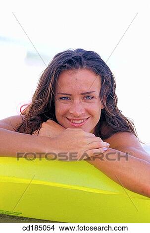 air-bed, carefree, brunette, air mattress View Large Photo Image Picture - air-bed, carefree, brunette, air mattress. Fotosearch