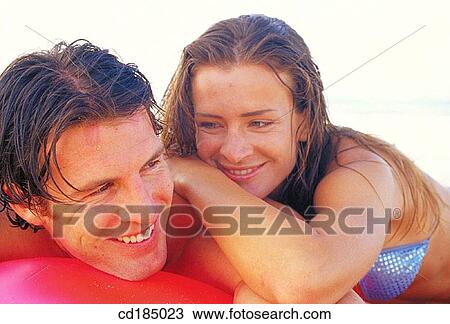 Stock Image - air mattress, bond, Best friend, air-bed, affection. Fotosearch