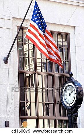 American flag, clock, building, Americana, America View Large Photo Image Stock Photo - American flag, clock, building, Americana, America. Fotosearch