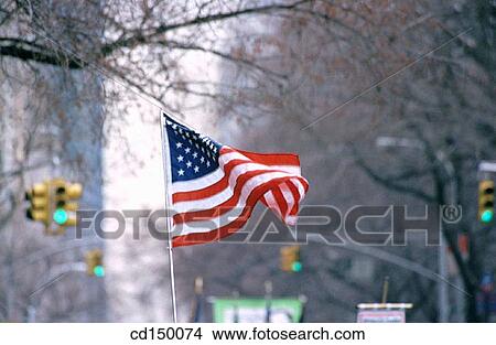 American flag, flag, city, Americana, America View Large Photo Image Picture - American flag, flag, city, Americana, America. Fotosearch