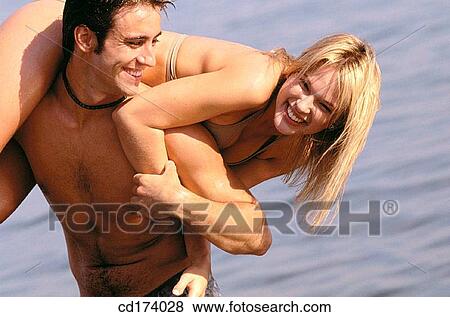 amusement, Best friend, beach, bathing-suit, adolescence View Large Photo Image Stock Photo - amusement, Best friend, beach, bathing-suit, adolescence. Fotosearch
