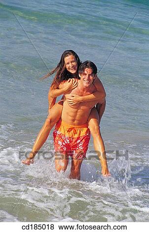 amusement, black hair, Best friend, beach, activity View Large Photo Image Stock Photo - amusement, black hair, Best friend, beach, activity. Fotosearch