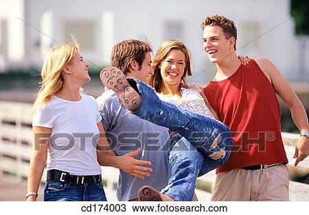 amusement, blond, black hair, adolescence View Large Photo Image Stock Image - amusement, blond, black hair, adolescence. Fotosearch