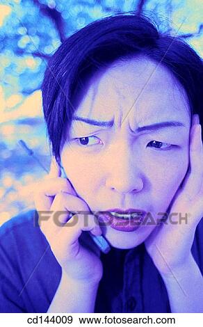 Asian-American, Close-up, cell phone, calling, Asian View Large Photo Image Stock Photo - Asian-American, Close-up, cell phone, calling, Asian. Fotosearch