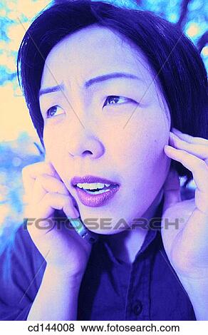 Asian, cell phone, calling, Asian-American, anticipation View Large Photo Image Stock Photo - Asian, cell phone, calling, Asian-American, anticipation. Fotosearch