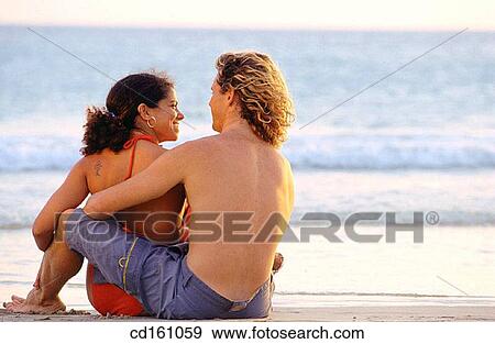 attraction, Best friend, beach, back view, affection View Large Photo Image Stock Photo - attraction, Best friend, beach, back view, affection. Fotosearch