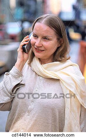 baby boomer, calling, blond, absorbed View Large Photo Image Picture - baby boomer, calling, blond, absorbed. Fotosearch