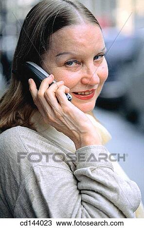 baby boomer, calling, cell phone, city View Large Photo Image Stock Image - baby boomer, calling, cell phone, city. Fotosearch