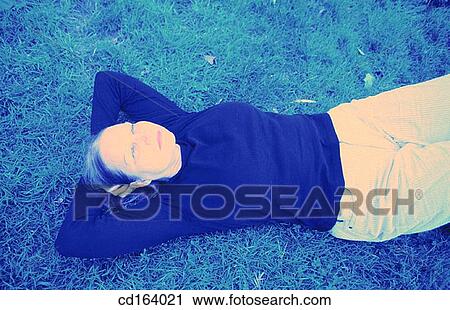 Stock Image - baby boomer, calm, carefree, chilling out. Fotosearch