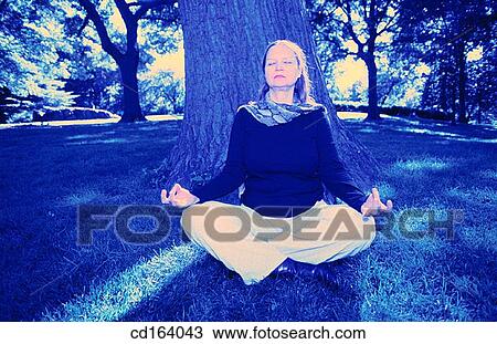 Stock Image - baby boomer, calm, chilling out. Fotosearch
