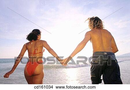 back view, beach, Best friend, carefree View Large Photo Image Picture - back view, beach, Best friend, carefree. Fotosearch