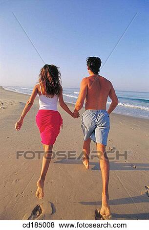 back view, carefree, brunette, beach, activity View Large Photo Image Stock Photo - back view, carefree, brunette, beach, activity. Fotosearch