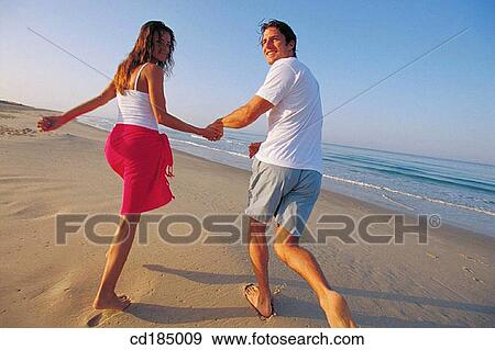 back view, carefree, brunette, beach, activity View Large Photo Image Stock Photo - back view, carefree, brunette, beach, activity. Fotosearch