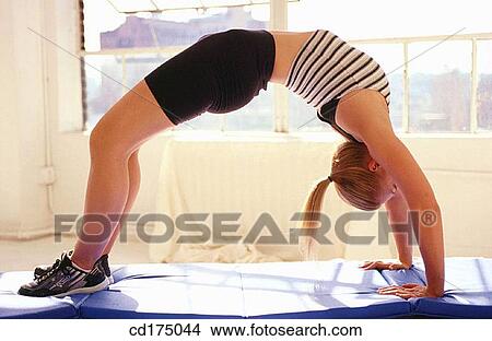 balance, bend, bending, bent, blond View Large Photo Image Picture - balance, bend, bending, bent, blond. Fotosearch