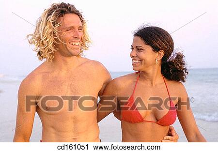 Stock Image - beach, Best friend, bond, bonding. Fotosearch
