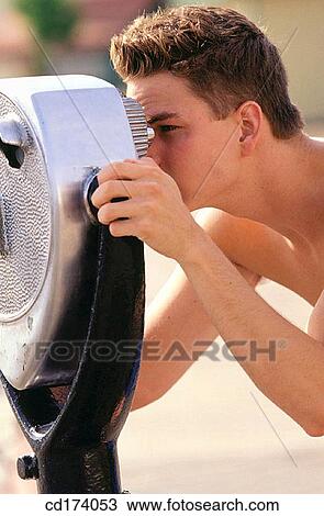 Stock Image - beach, boy, binocular, adolescence. Fotosearch