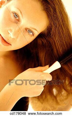 Stock Photo - beauty, brush, brunette, Beauty Care, activity. Fotosearch