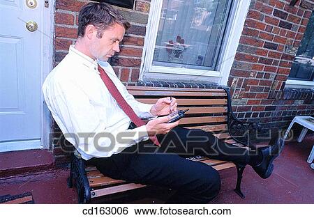 Stock Photograph - bench, business, businessman, businesspeople. Fotosearch