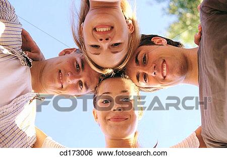 Stock Photograph - Best friend, black hair, blond, bond, bonding. Fotosearch