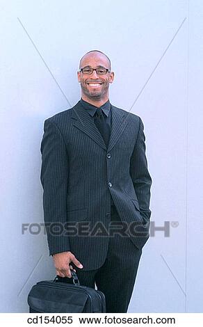 Black executive with briefcase View Large Photo Image Stock Photography - Black executive with briefcase. Fotosearch