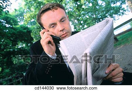 Stock Image - black hair, business, businessman, businesspeople, calling. Fotosearch