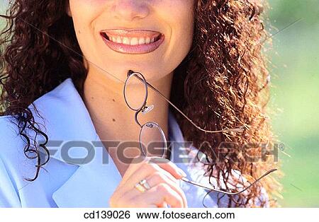 Stock Photograph - brunette, contemporary, Curly hair, dark hair. Fotosearch