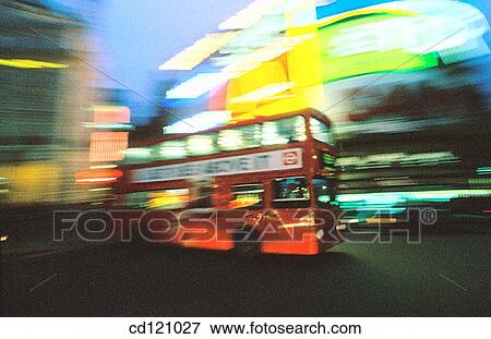Stock Photo - Bus at Piccadilly Circus at night. London. England. Fotosearch