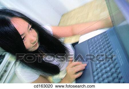 Stock Image - business, businesswoman, businesspeople, Asian-American. Fotosearch