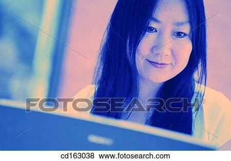 Stock Photo - business, businesswoman, businesspeople, Asian-American. Fotosearch