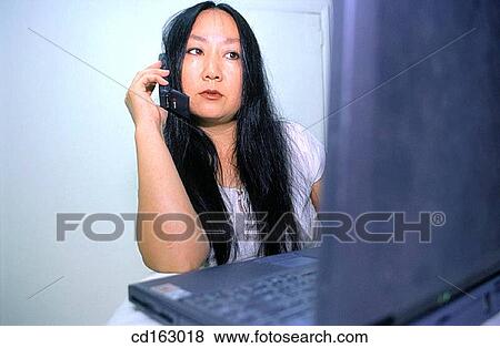 business, calling, businesswoman, businesspeople, Asian-American View Large Photo Image Stock Photo - business, calling, businesswoman, businesspeople, Asian-American. Fotosearch