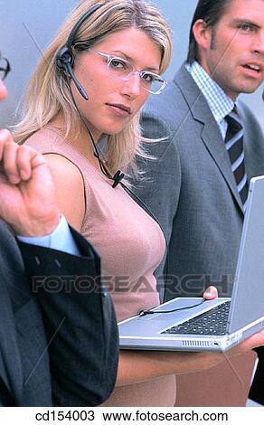 Stock Image - Business, Communication, Laptop, Headset. Fotosearch