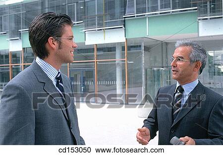 Stock Image - Business, Explanation, Conversation. Fotosearch