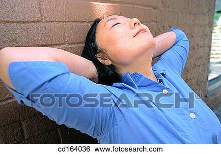calm, chilling out, carefree, Asian-American View Large Photo Image Stock Photograph - calm, chilling out, carefree, Asian-American. Fotosearch