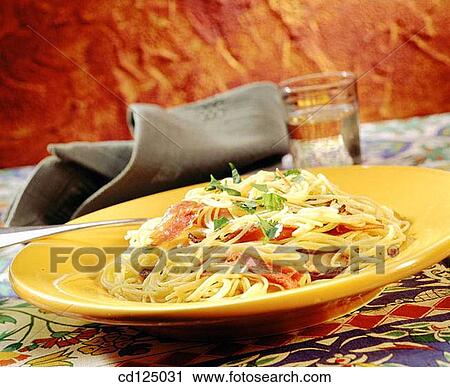 Cappeletti pasta with prosciutto, mushrooms and bechamel sauce View Large Photo Image Stock Image - Cappeletti pasta with prosciutto, mushrooms and bechamel sauce. Fotosearch