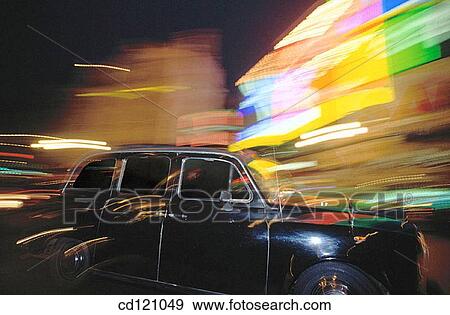 Stock Photo - Car at Piccadilly Circus at night. London. England. Fotosearch