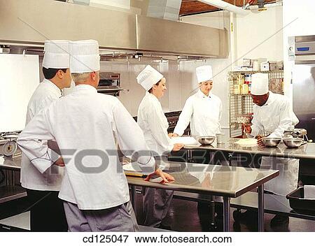 Chef with trainees View Large Photo Image Stock Photo - Chef with trainees. Fotosearch