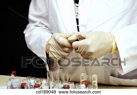 Stock Photo - Clinical test, health, hand, glove, analysis. Fotosearch