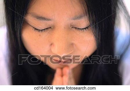 Close-up, contemplate, concept, Asian-American View Large Photo Image Picture - Close-up, contemplate, concept, Asian-American. Fotosearch