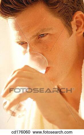 Stock Image - Close-up, dark hair, action. Fotosearch