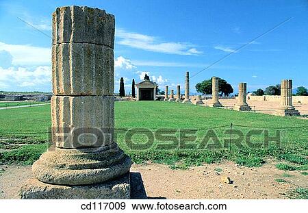 Columns at the temple area. Roman ruins of the old city of Ampurias (Emporion). Girona province. Spain View Large Photo Image Stock Photo - Columns at the temple area. Roman ruins of the old city of Ampurias (Emporion). Girona province. Spain. Fotosearch