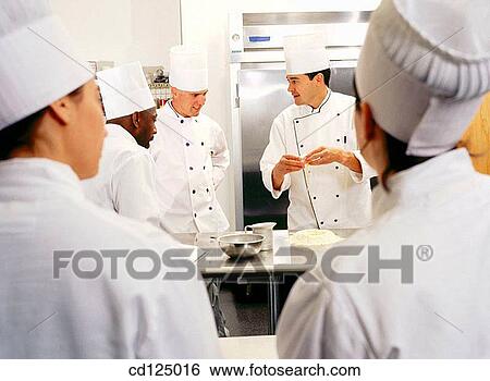 Stock Photograph - Cooking demonstration. Fotosearch