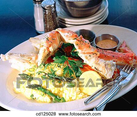 Crab with rice and asparagus View Large Photo Image Stock Photo - Crab with rice and asparagus. Fotosearch