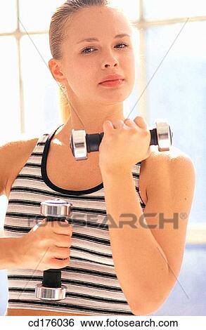 Stock Photograph - day, dumbbell, arm. Fotosearch