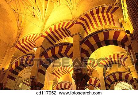 Detail of open horseshoes arches supporting the vaults in the Great Mosque. Cordoba. Spain View Large Photo Image Stock Image - Detail of open horseshoes arches supporting the vaults in the Great Mosque. Cordoba. Spain. Fotosearch