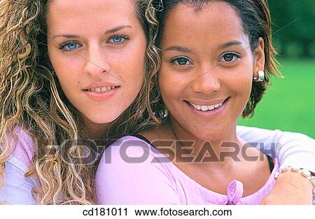 Stock Image - Friendship, Embrace, Happy. Fotosearch