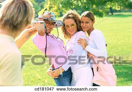 Friendship, Embrace, Photograph View Large Photo Image Stock Photo - Friendship, Embrace, Photograph. Fotosearch