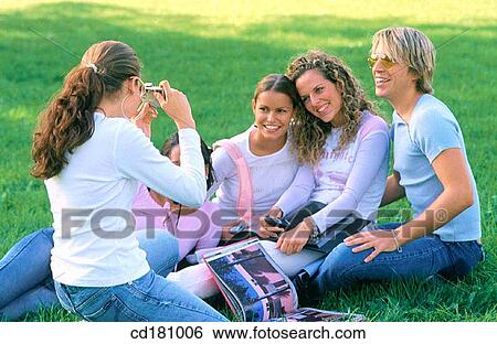 Stock Photograph - Friendship, Leisure, Photographing. Fotosearch