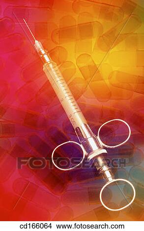 Picture - Glass syringe and capsules. Fotosearch