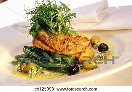 Halibut cheeks with olive oil, olives and summer green beans View Large Photo Image Stock Photo - Halibut cheeks with olive oil, olives and summer green beans. Fotosearch