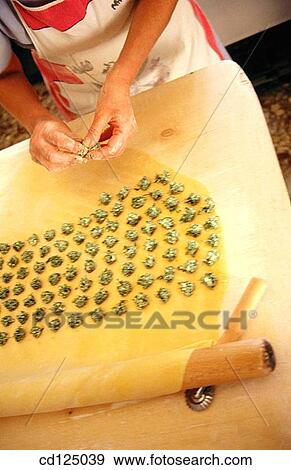 Hand making raviolli View Large Photo Image Stock Photo - Hand making raviolli. Fotosearch